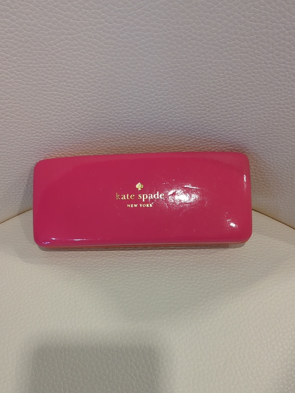 kate spade glossy fuchsia hard eyeglass case with gold logo and 1.25 Readers
